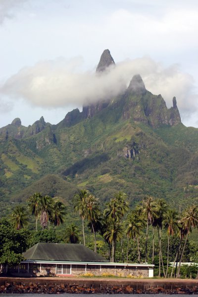 The spires of Ua Pou peaked out once before we left.